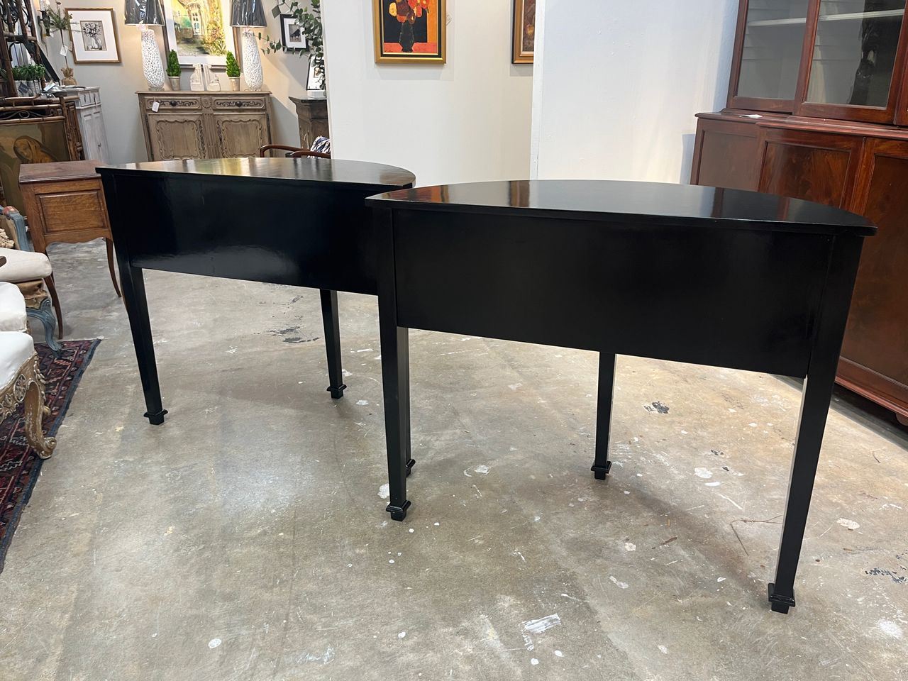 Pair of Black Lacquered Demilune Tables