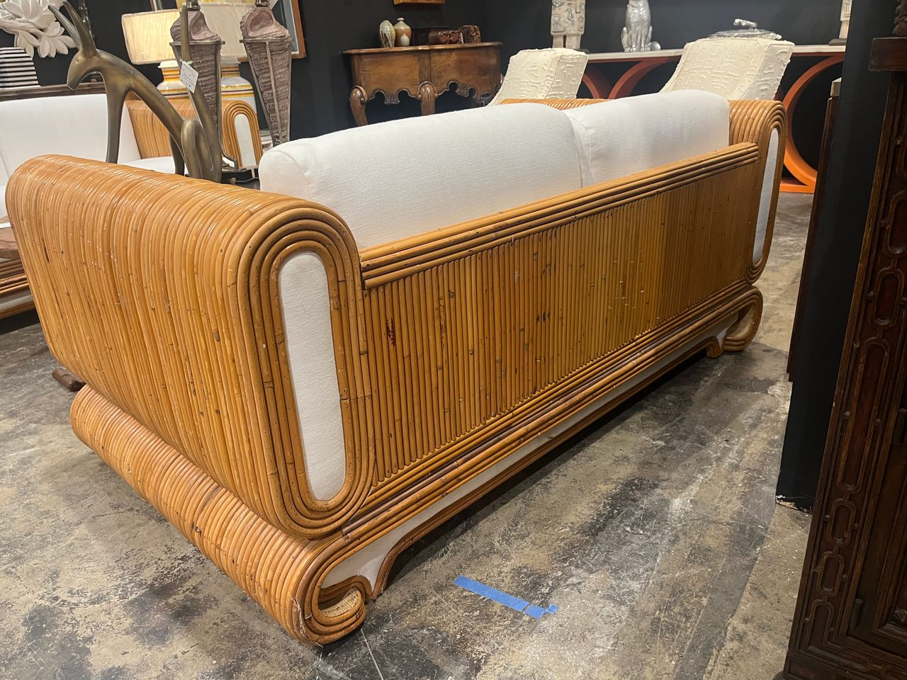 Pair of 70's Crespi Style Rattan Loveseats