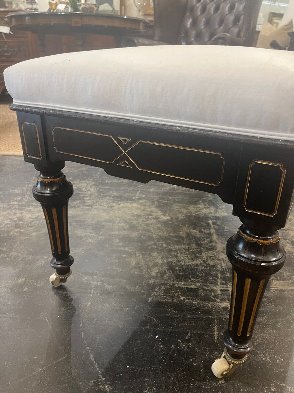 19th Century Bench Ebonized with gilt accenting, stamped brass, on Casters